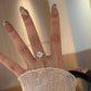 Ethereal Halo Moissanit-Ring aus 925er Silber mit Halo-Fassung und Weißgoldplattierung