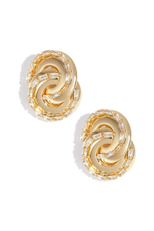 Maglina Éternelle Knot earrings with intertwined infinity knot design and sparkling zircon stones in gold and silver